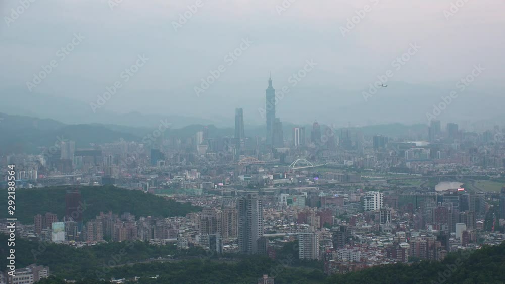 TAIPEI, TAIWAN - CIRCA AUGUST 2019 : Aerial view of cityscape of Taipei at sunset time. View around shopping and business district at Xinyi area. TAIPEI, TAIWAN - CIRCA AUGUST 2019 : Aerial view of cityscape of Taipei at sunset time. View around shopping and business district at Xinyi area.