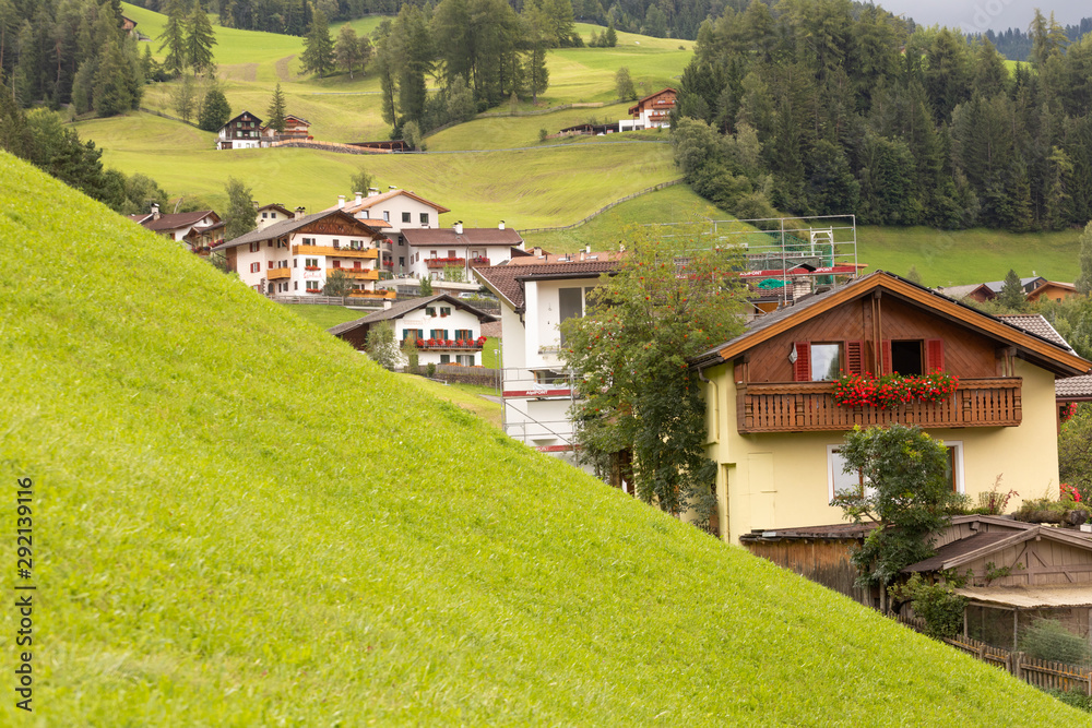 View of the Italian village of Santa Maddalena. Perfect landscape with mountains