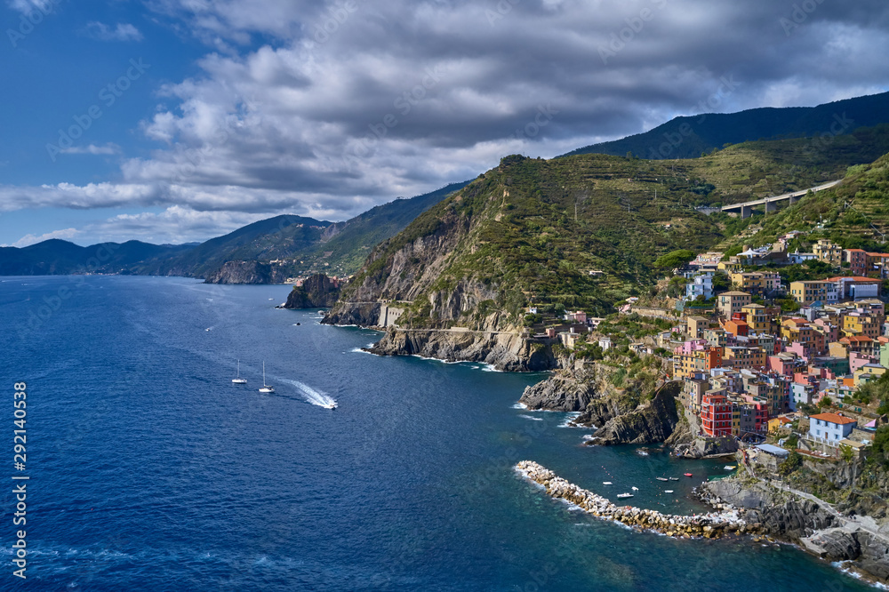 Panorama view of Riomaggiore village one of Cinque Terre in La Spezia, Italy. Flight by a drone.