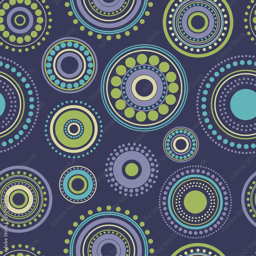 Seamless abstract pattern green, yellow and turquoise circles and dots on dark blue. Kaleidoscope background