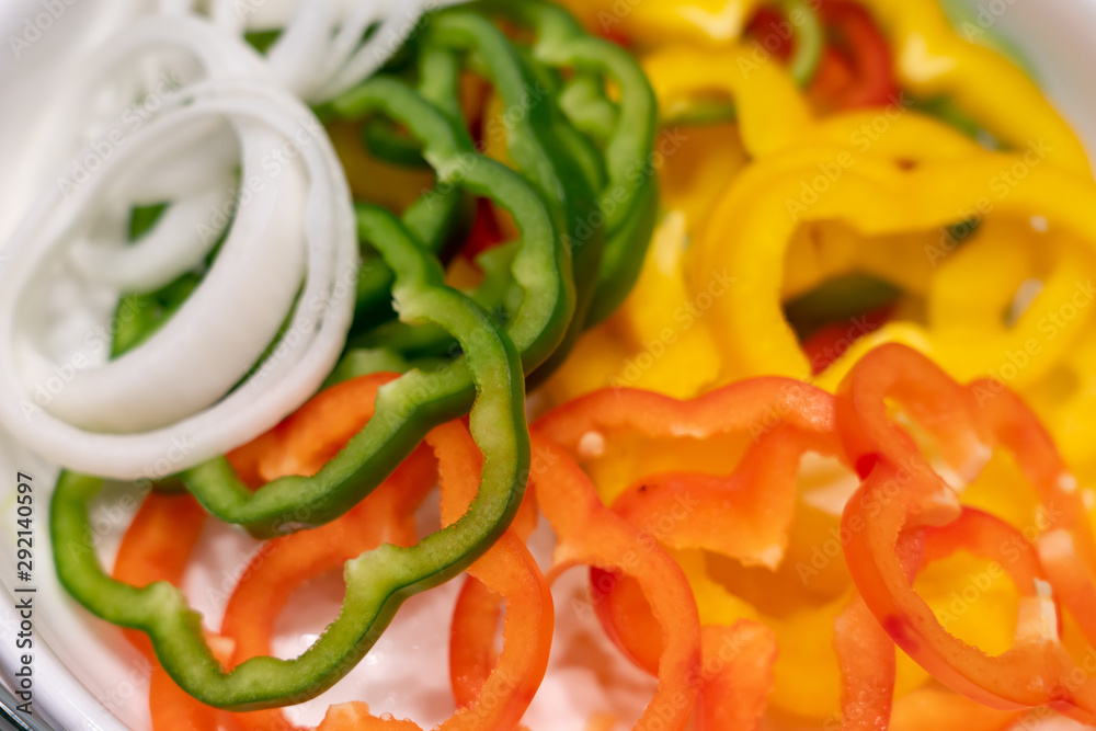 Fresh Onion and Green, Red, Yellow pepper sliced. Fresh Onion and Green, Red, Yellow pepper sliced.
