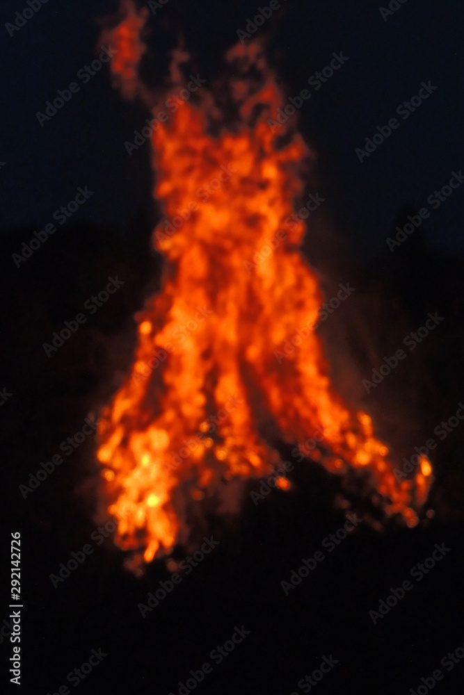 bonfire burns at night