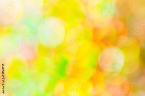 Sunny yellow, red, green blurred bokeh