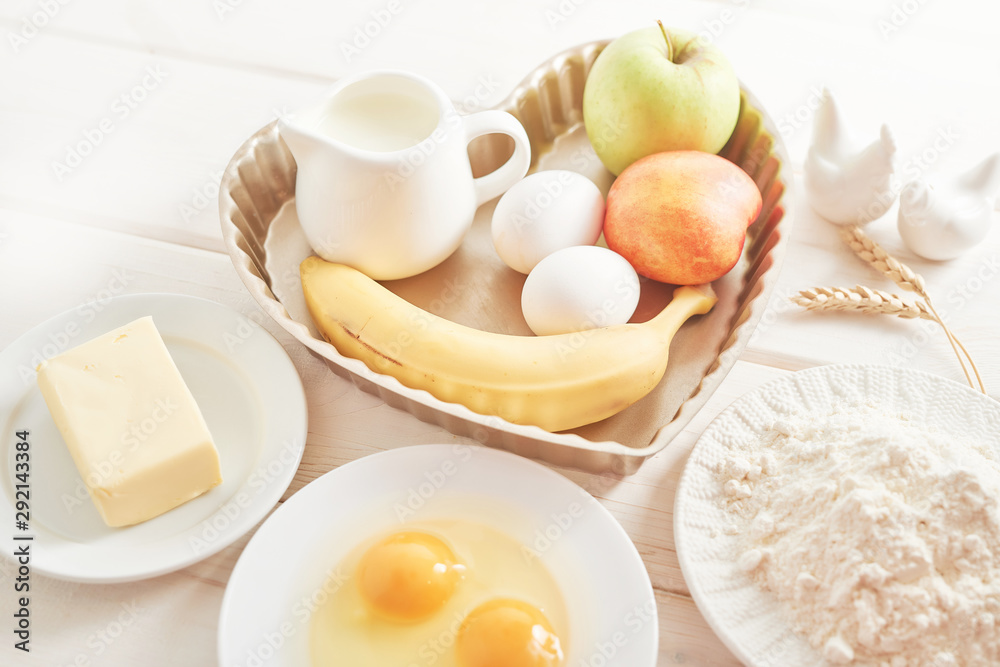 pie with banana, apples and nectarine on a white wooden background pie with banana, apples and nectarine on a white wooden background
