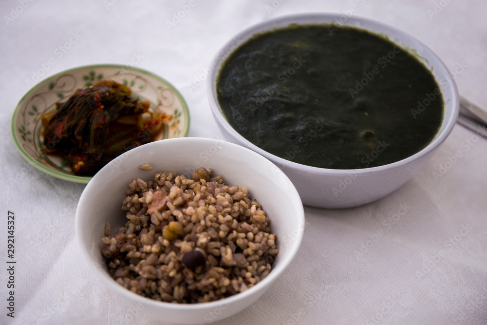 Seaweed fulvescens with oyster soup which is called Maesaengi guk, Korean seaweed soup Seaweed fulvescens with oyster soup which is called Maesaengi guk, Korean seaweed soup