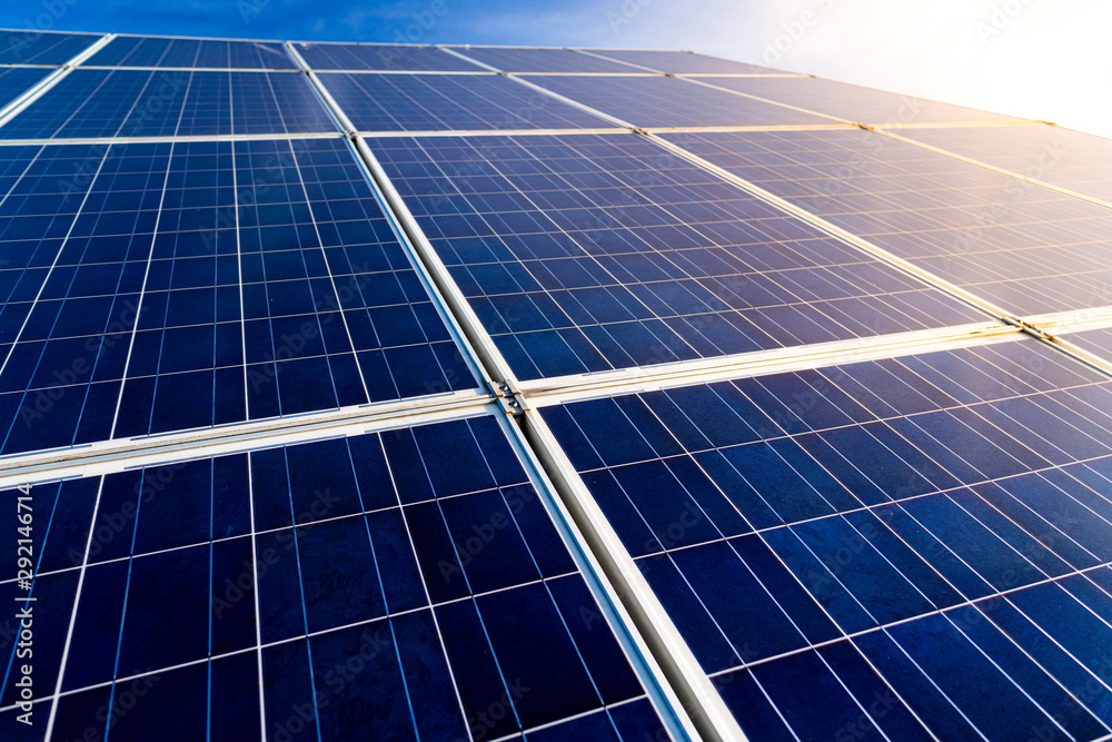 Commercial solar panel close up showing the cell detail with the sun ...