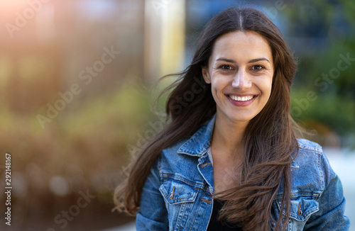 Fotografie Portrait of young woman in urban area