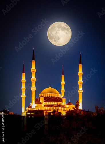 Kocatepe Mosque at night under full moon, Ankara, Turkey.