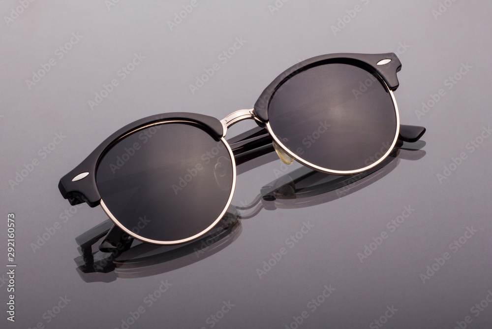 black dots on a dark background illuminated by light on the surface of the glass black dots on a dark background illuminated by light on the surface of the glass