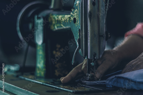 woman working on sewing machine