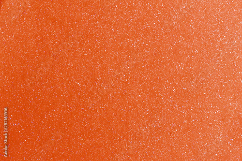 Abstract detail background of a Orange glitter shining