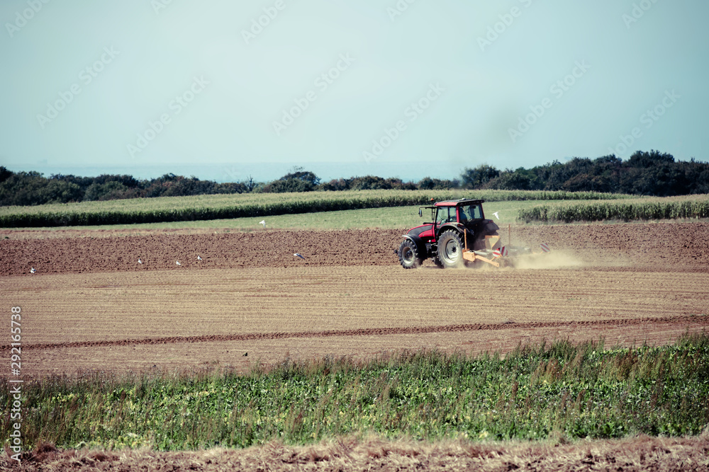 nice view of a farmer plowing his fields nice view of a farmer plowing his fields