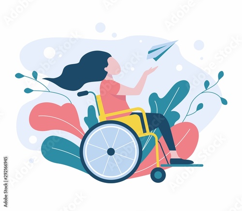 Disabled girl sitting in a wheelchair photo
