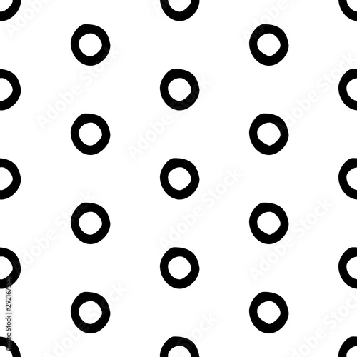 Abstract polka dot pattern with hand drawn dots. Cute vector black and white polka dot pattern. Seamless monochrome doodle polka dot pattern for textile, wallpapers, wrapping paper, cards and web.