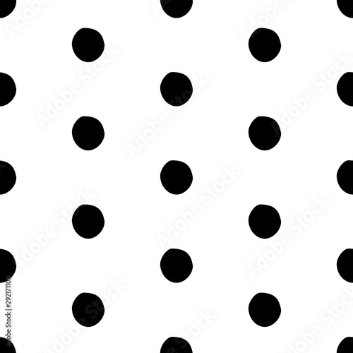 Abstract polka dot pattern with hand drawn dots. Cute vector black and white polka dot pattern. Seamless monochrome doodle polka dot pattern for textile, wallpapers, wrapping paper, cards and web.