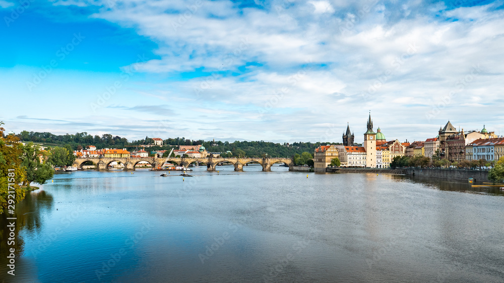 Prague and the Vlatava River. The Charles Bridge and Old Town Bridge Tower landmarks in the Czech Republic capital city.