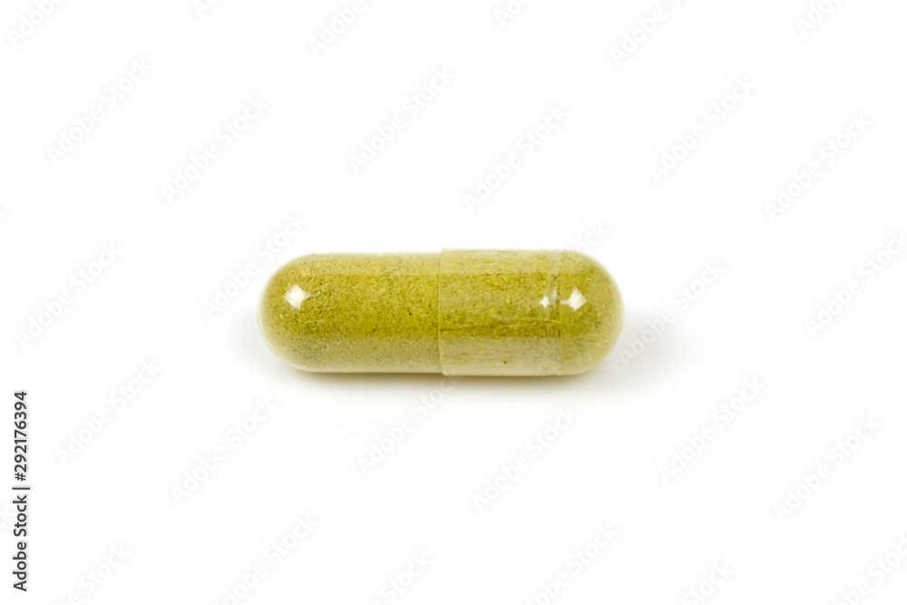 Close up single moringa oleifera capsule isolated on white background. Close up single moringa oleifera capsule isolated on white background.
