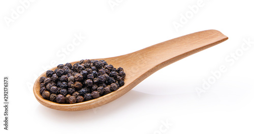 peppercorns in wood spoon isolated on white background