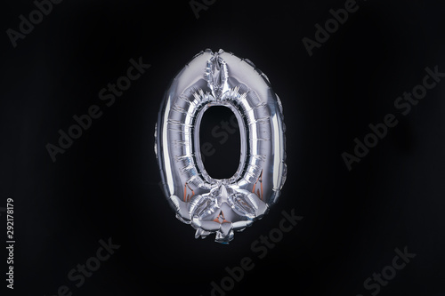 Number 0 chrome balloon isolated on black background