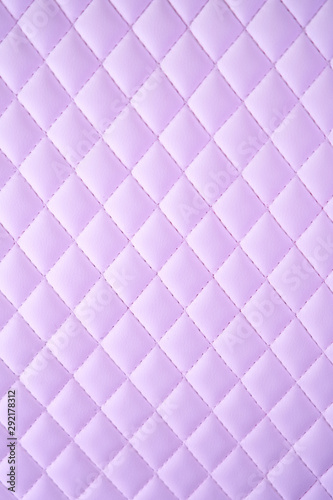 Geometric diamond pattern quilted PU leather in neon light