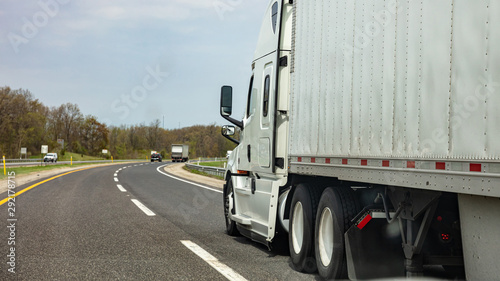 Truck on a highway in US, closeup side view