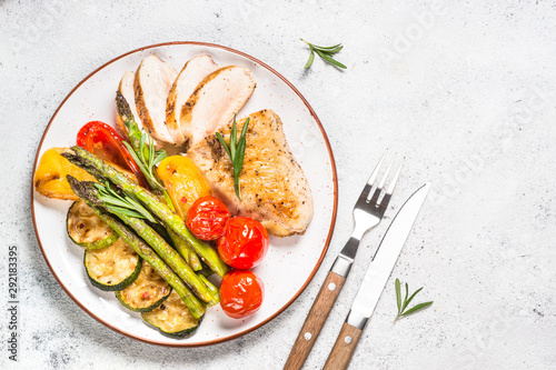 Chicken breast grilled with vegetables. photo