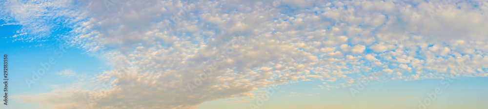 Soft clouds and blue sky with sunlight background