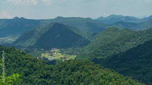 View of the city in the middle of mountains and forests