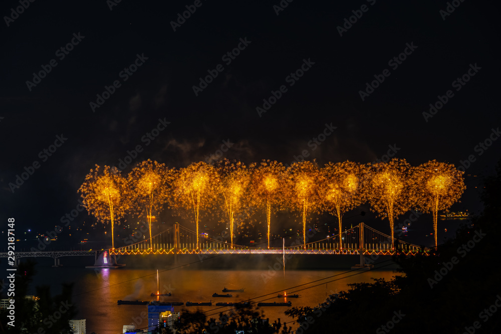 Colorful firework festival at Gwangan Bridge in Gwangalli beach, Busan South Korea.