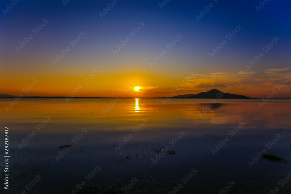 Sunset in the Amazon Rainforest River Basin stock photo