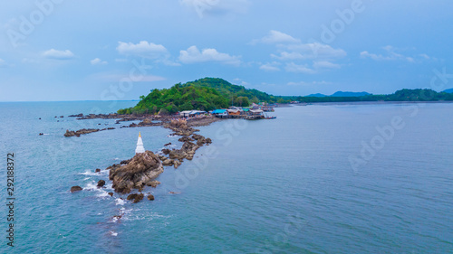 Aeril view of seascape of Chantaburi province, Thailand. Scenery consist of blue sea, blue sky with cloud, fisherman village along the bay.