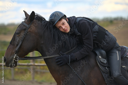 Teenage boy with a horse