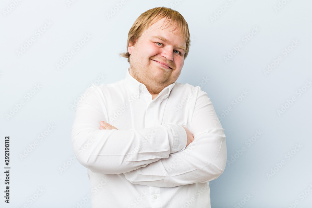 Young authentic redhead fat man laughing and having fun. Young authentic redhead fat man laughing and having fun.