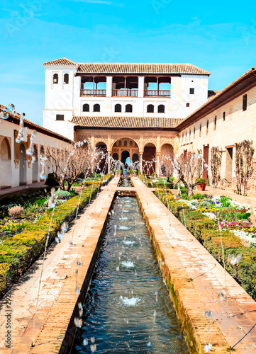 Gardens of the Alhambra monument in the spanish city of Granada in a sunny day.