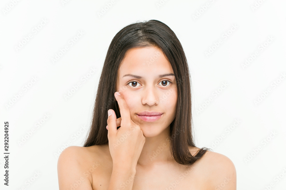 Close up of a beautiful and natural hispanic young woman Close up of a beautiful and natural hispanic young woman