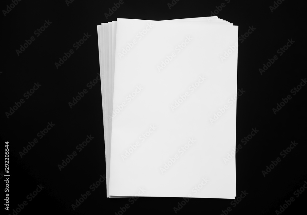 Top view of blank business cards isolated on black background. Poster mock-ups paper, white paper Blank portrait A4. brochure magazine isolated, use banners products business cards to showcase your Top view of blank business cards isolated on black background. Poster mock-ups paper, white paper Blank portrait A4. brochure magazine isolated, use banners products business cards to showcase your