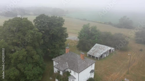 Aerial push in and fly over of the Pearl S. Buck birthplace museum in Hillsboro, West Virginia. photo