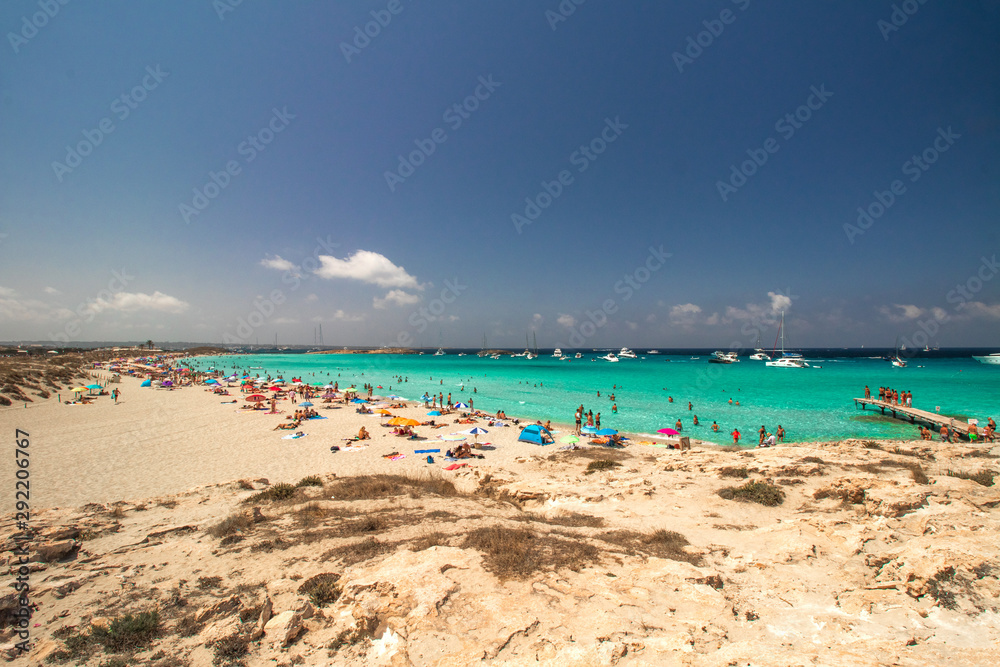 beach with umbrellas and sunbeds-formentera