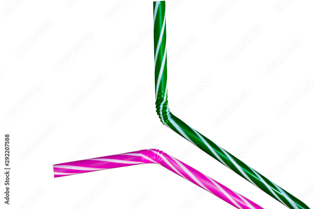 Green and yellow drinking straws isolated on white background Green and yellow drinking straws isolated on white background