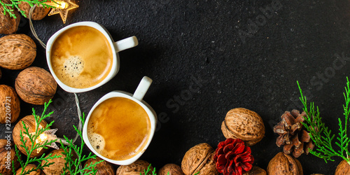 coffee, New Year, Christmas background or Noel holiday festive (nuts, cones, specials, decorations and gifts on the table, greeting card) winter menu concept. food background. copy space. Top view