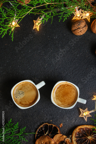 coffee, New Year, Christmas background or Noel holiday festive (nuts, cones, specials, decorations and gifts on the table, greeting card) winter menu concept. food background. copy space. Top view