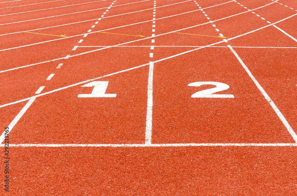 1 2 number, start or finish position  on race track in football stadium.