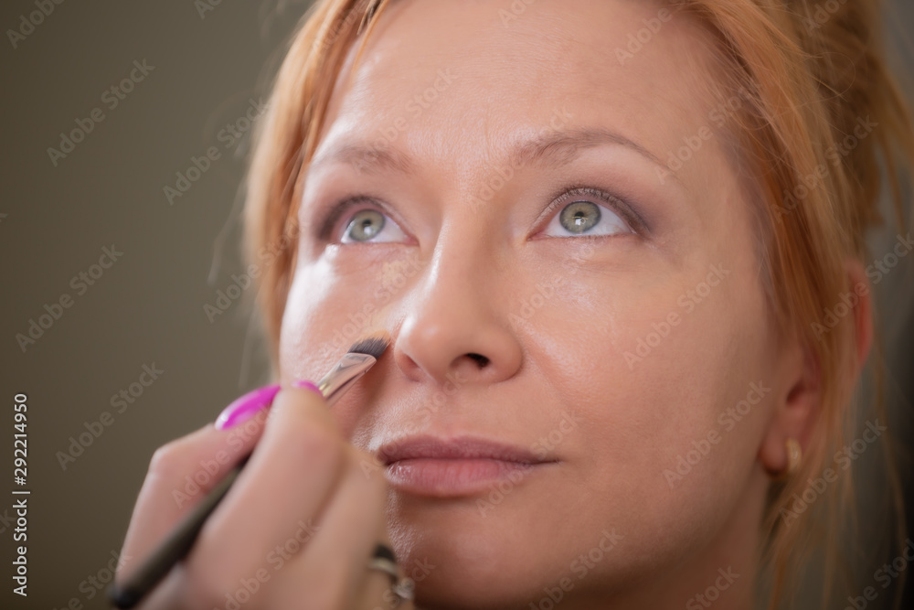 Make Up Artist Making Make Up For A Female Klient Make Up Artist Making Make Up For A Female Klient
