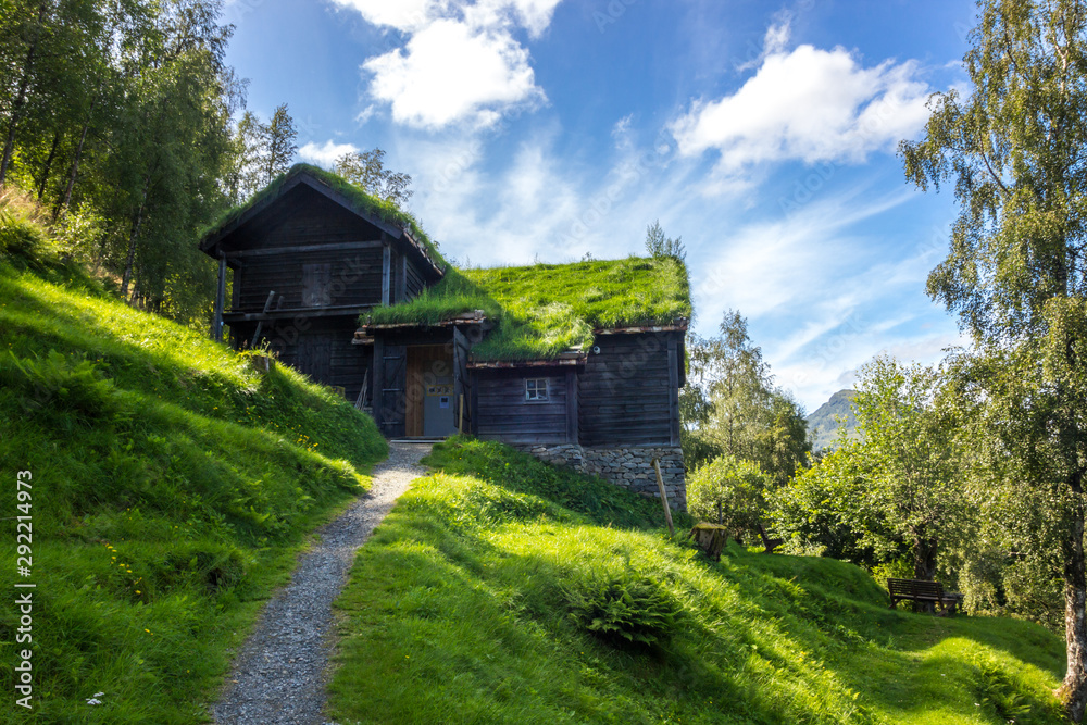old wooden house on the lake in mountains old wooden house on the lake in mountains