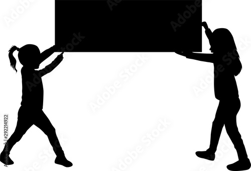 Children holding a poster or a sign board.