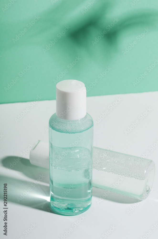Micellar water, makeup remover transparent bottles mockup. Facial remedy blank plastic packages