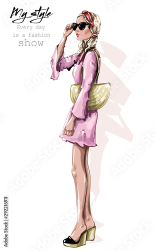 Hand drawn beautiful young woman in sunglasses. Stylish girl with bag. Fashion woman outfit. Sketch. Vector illustration.