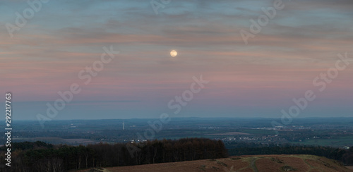 Moon landscape with red clouds