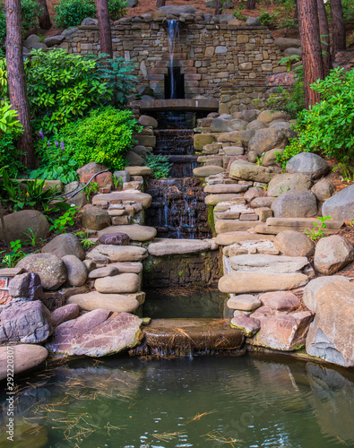 Cascading fountain with a stones in landscape design