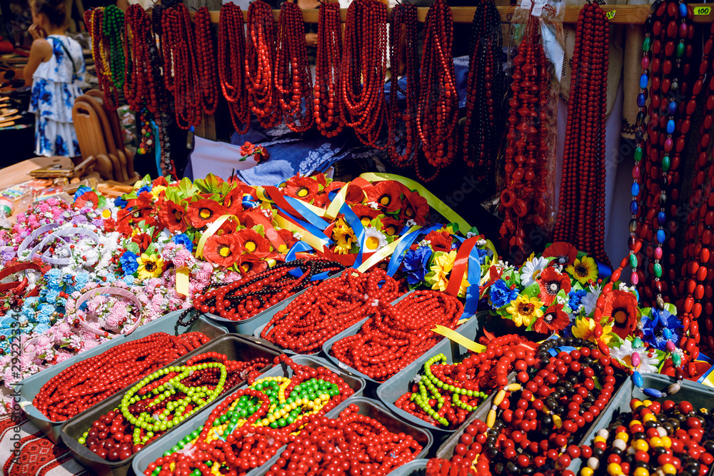 Fototapeta premium Red beads made of wood. Brightly.